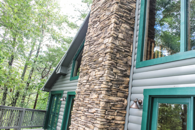 Cabin renovation | stone chimney